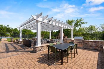 BBQ Patio Area at Heights at Glen Mills Apartments in Glen Mills, PA 19342